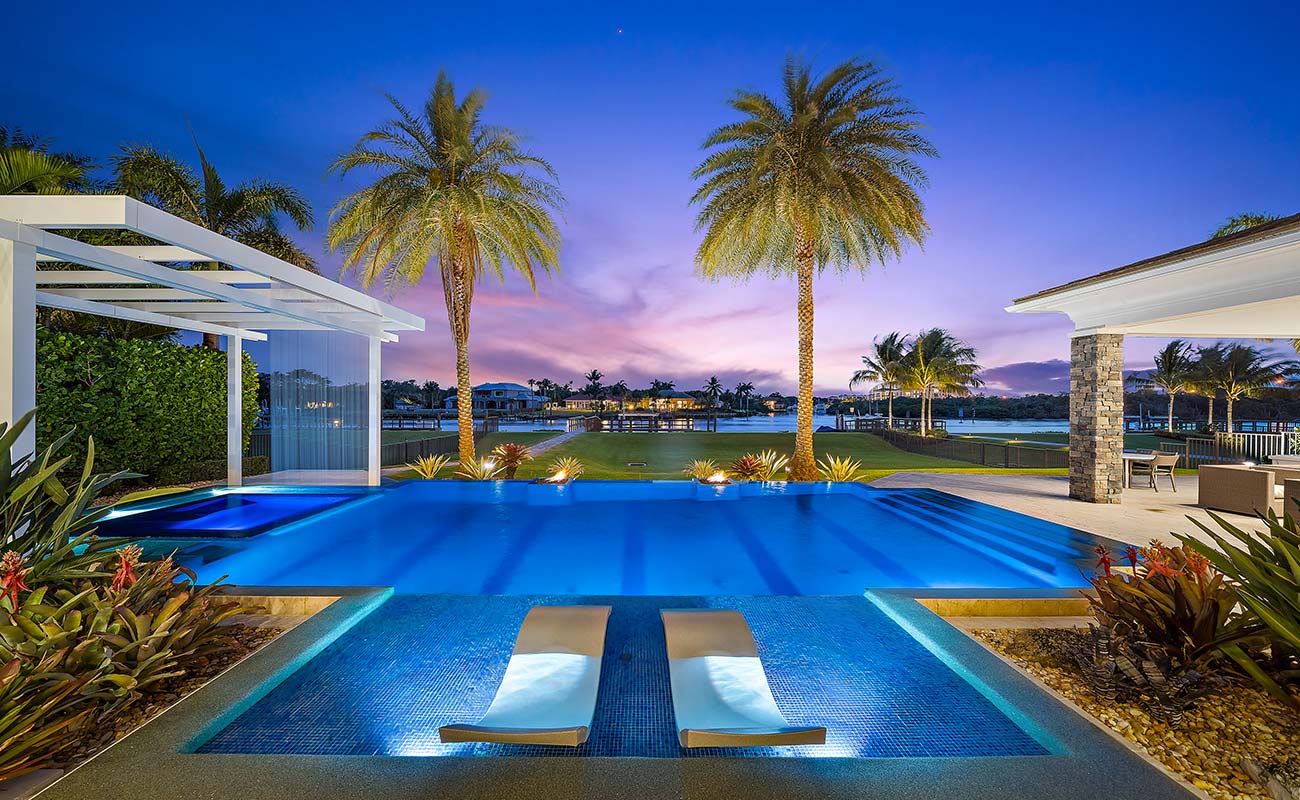 Luxury waterfront property at dusk